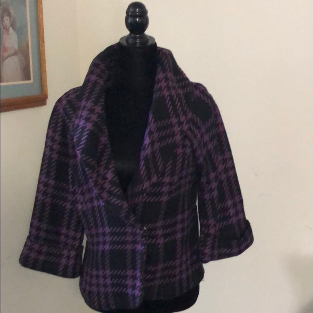 Purple and black plaid jacket.